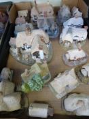 Twenty unboxed Lilliput Lane thatched houses  to include 