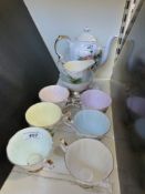 A Paragon tea set in World Famous Roses pattern