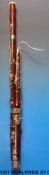 A cased Adler Sonara bassoon with maple body and silver plated furniture, model M1357/1,