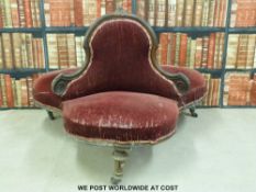 A 19thC triform love seat with carved show wood frame,