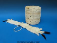 An ermine muff in original box