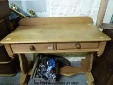 A pine sidetable or washstand fitted two drawers (w105 x d50 x h80cm)