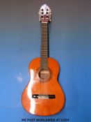 A child's Spanish guitar by Vallentia,