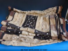 Two Kuba dance skirts with shell decoration and geometric pattern, Democratic Republic of the Congo,