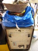 An Airco Bumblebee AC/DC welder with welding rods,