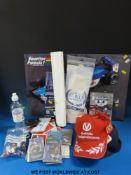 Two Formua 1 caps, a freestanding promotional picture, key rings, driver's gloves, paddock passes,