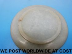 A small Chinese jade snuff dish of spinach type,