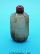 An 18thC Chinese jade snuff bottle with carved ivy design (6.
