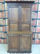 A 19thC mahogany bookcase over cupboard with brush slide (w93 x d48 x h185cm)