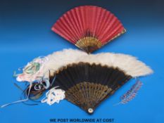 A small collection of folding hand fans to include faux tortoiseshell and feather two,