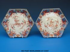 A pair of 18th / 19thC Japanese octagonal plates with Imari dragon decoration (19cm diameter)