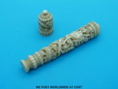 An ivory Chinese needle case with carved dragon decoration (9.