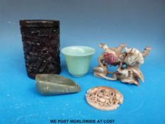 A Chinese carved brush pot together with a hardstone dragon and pendant,