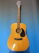 A Fender F35 acoustic six string guitar in hard case c1975