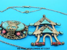 Two Chinese brooches set together with a yellow metal necklace with two jadeite drop sections