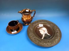 A painted ceramic bowl in metal frame together with a lustreware jug and a cup and saucer