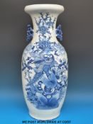 A large Chinese blue and white twin-handled vase decorated with birds and flowers with wax seal to