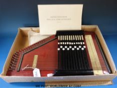 An autoharp in mahogany finish in original box