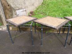 Four tile-topped conservatory or garden tables