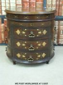 A brass inlaid circular chest of drawers with brass rod interior locking system (diameter 45cm x