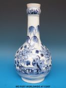 An 18thC Chinese blue and white juglet with knopped neck,