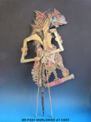 A 19thC Wayang Kulit Indonesian hide puppet depicting 