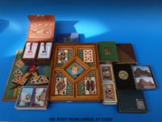 A quantity of mid-20thC quantity of double playing card games, game sets etc,