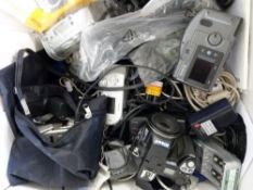 A quantity of digital cameras and accessories, a Nikkon Nikkor 50mm 1:1.4 and an 85cm 1:1.