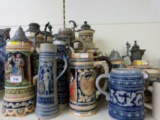 A collection of large Bavarian Mettlach style steins, early to mid 19thC,