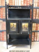 A Japanese style cabinet with four lacquered panels,