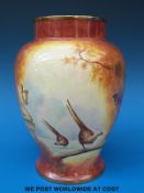 A Coalport hand-painted vase of bulbous form,