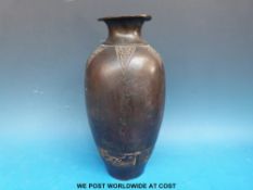 A Chinese bronze vase with archaistic design, possibly Ming Dynasty, 27cm tall.