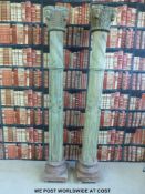 A pair of carved pine columns with octagonal central section (height approximately 210cm)