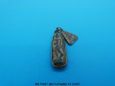 Two Eastern hardstone pendants in yellow metal mounts (4.5 and 2.