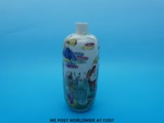 An unusual 19thC Chinese perfume bottle decorated with various immortals (12cm tall)