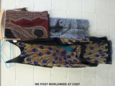 Hand-made woollen shawls and a dress with peacock print by Sora Couture