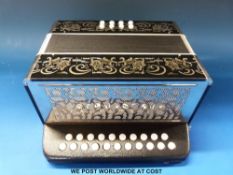 A two row poker work East German Gremlin melodeon in  C / C# and in original box