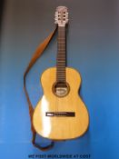 A Giannina inlaid acoustic guitar in soft case