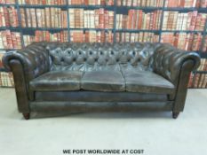A three seat button back Chesterfield sofa (w209cm)