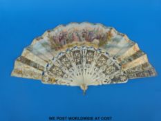 A 19thC pierced and carved bone fan elaborately decorated in gilt and silver,