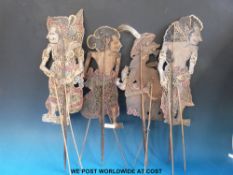 Four hide or pierced leather Indonesian puppets