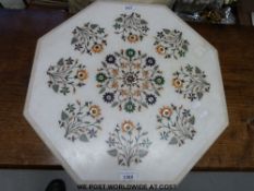 An octagonal pietra dura table top,