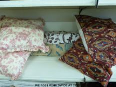 Two rolls of Kashmiri hand embroidered crewel work together with four embroidered cushions and