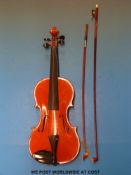 A cased Romanian violin with two bows (35.