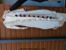 A Victorian full length dress with silk pleats,