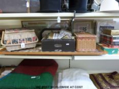 A quantity of needlework to include oriental style examples, various needlework threads,