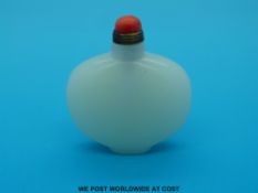 A glass white jade style snuff bottle with stopper (6cm tall)