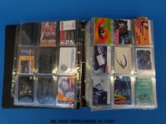 A large album of all world telephone cards including sport, glamour, film, wildlife etc.