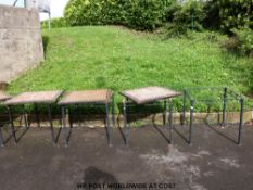 Four tile-topped conservatory or garden tables