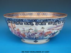 An 18thC Chinese Mandarin punch bowl with figural decoration on a blue ground (16.
